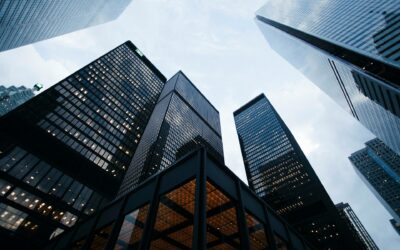 looking up at tall buildings, skyscrapers