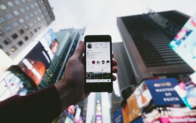 phone looking up to skyscrapers